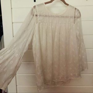 White blouse with flower details